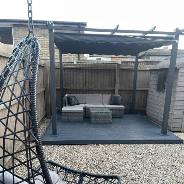 Outdoor patio with seating and pergola