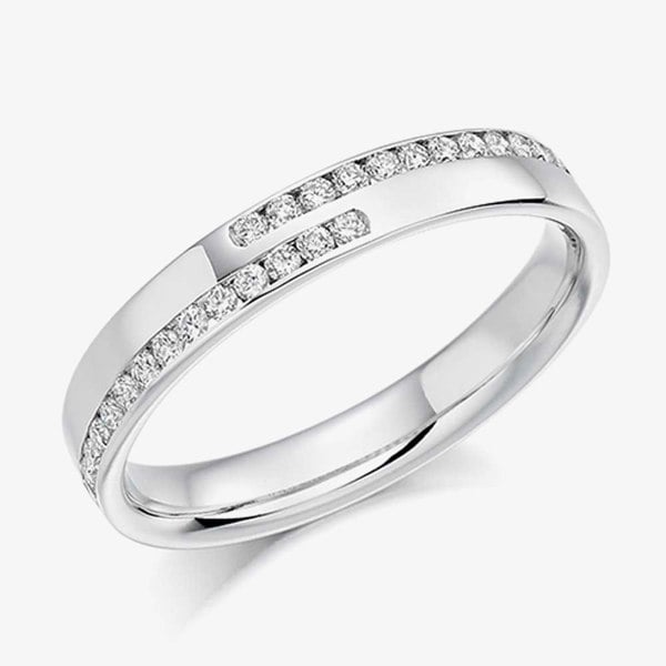 T. H. Baker Platinum 0.25ct Channel Set Round Brilliant Crossover Half Eternity Ring HET1177
