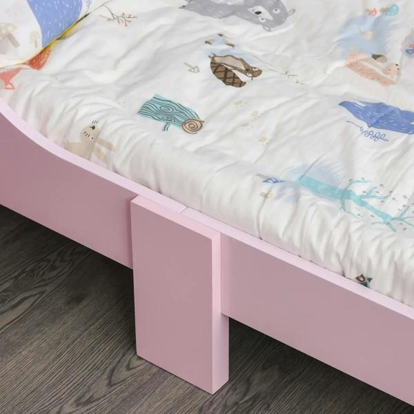 Pink bed frame side rail and slatted base with ocean-themed bedding