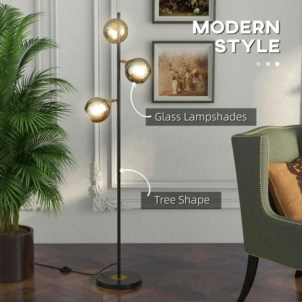 Grey tree floor lamp with three round glass lampshades and a slim black base