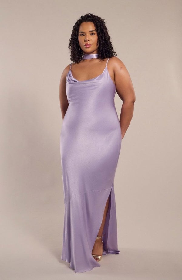 Model wearing cowl neck pollenca bridesmaids dress in lilac satin.