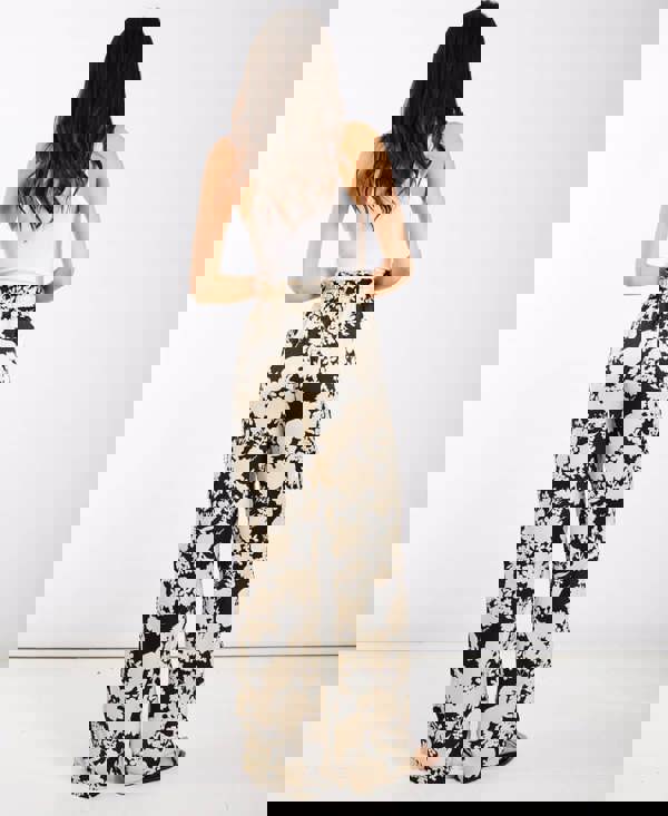 Ivory black printed wide trousers back