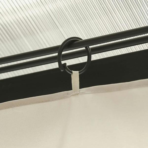 Beige curtain top C-ring attached to gazebo beam, close-up