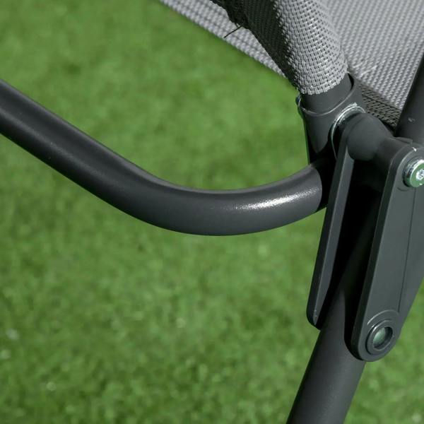 Close-up of light grey folding chair armrest and dark frame joint hardware