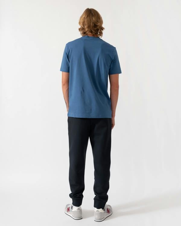 Back of the BOSS Green Hadiko Mens Stretch-cotton track pants with puff-print logo - Dark Blue 402