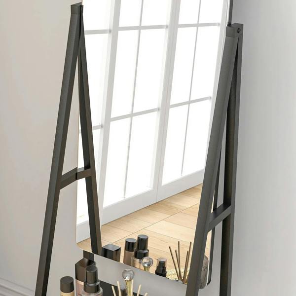 Black full-length dressing mirror with adjustable frame, showing shelf area and caster base