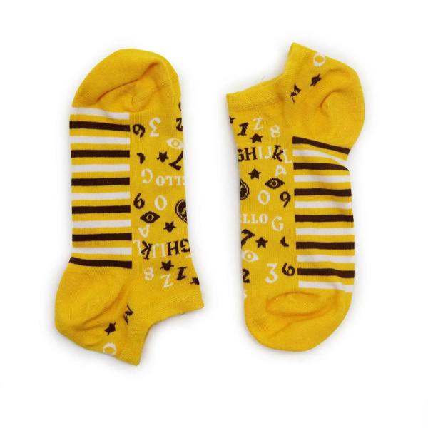Mustard yellow low-cut bamboo socks with black stripes and occult symbol print