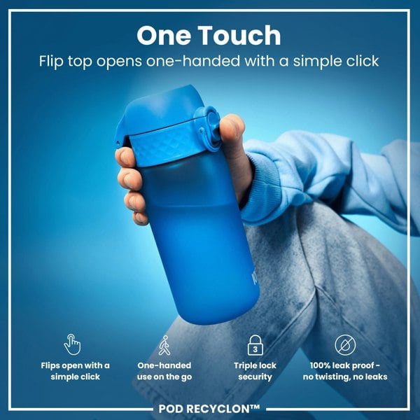 A blue water bottle is held; its flip top opens one-handed. The bottle is shown against a blue background and being held by a person wearing a light blue sweatshirt. One Touch. Flip top opens one-handed with a simple click. Flips open with a simple click. One-handed use on the go. Triple lock security. 100% leak proof - no twisting, no leaks. POD RECYCLON™.