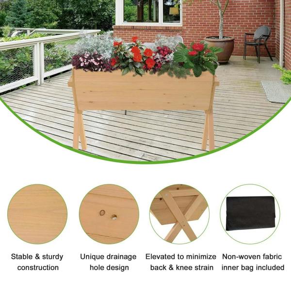 Raised wooden planter stand with open soil tray and four tapered legs outdoors.