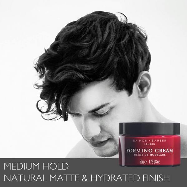 Shot of model in black and white with flowing quiff with Forming Cream Jar.