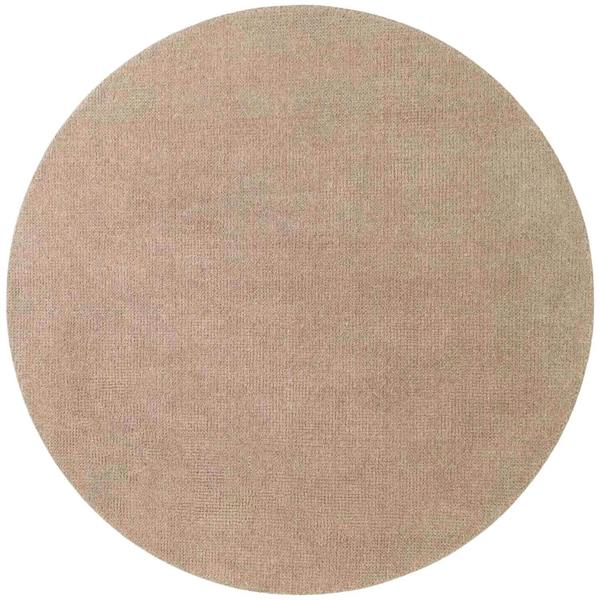 Round beige rug on a white background