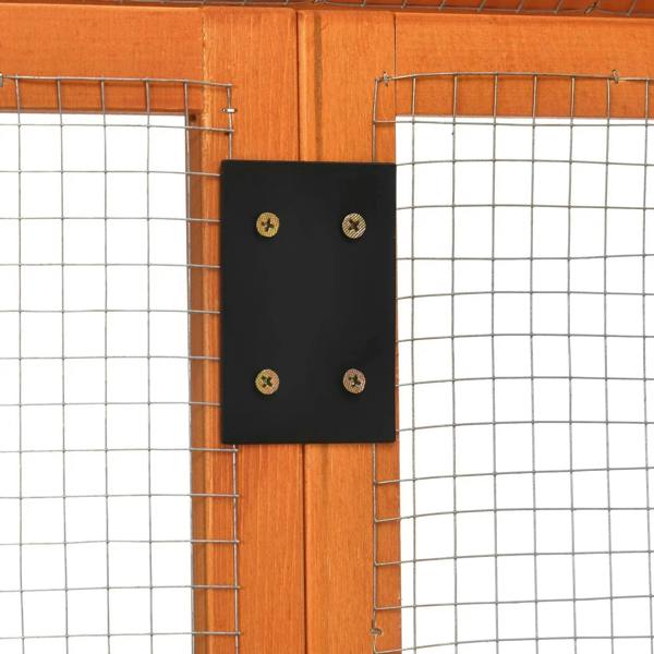 Black latch plate on orange wooden chicken run door frame with wire mesh