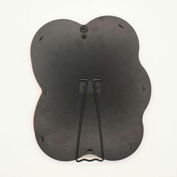 Back side of squiggly mirror, dark panel with two hanging straps