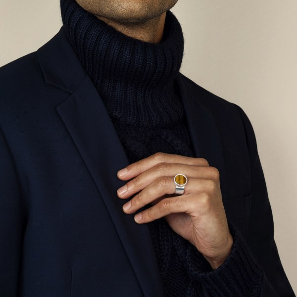 model wearing tigers eye ring in sterling silver