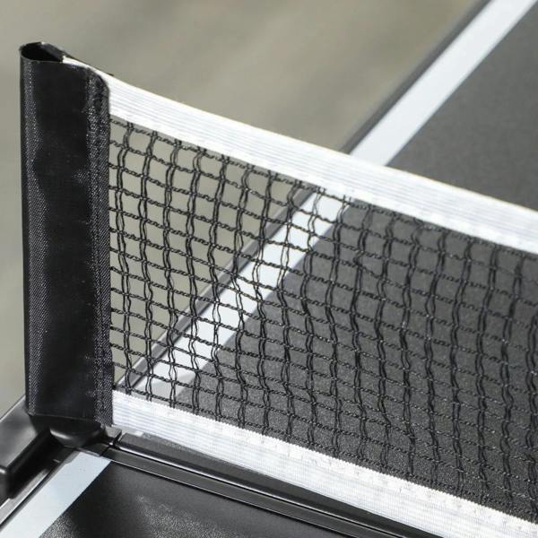 Close-up of net on aluminum posts for a black folding ping pong table