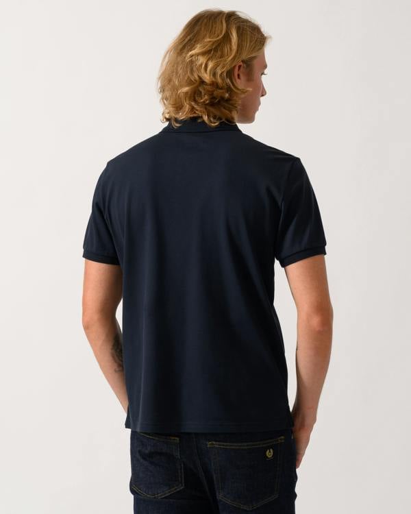 back of a model wearing a Parajumpers Wellington Mens Short Sleeve Polo in Blue Navy 316