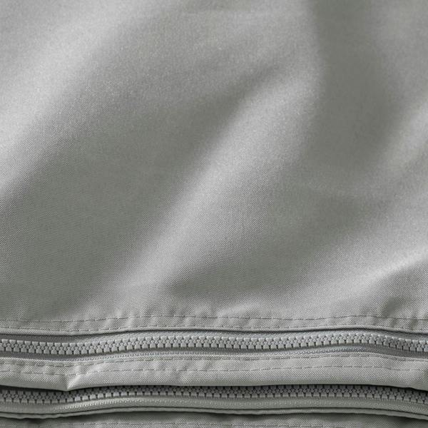 Light grey sidewall curtain with zipper and stitched lower edge seam detail