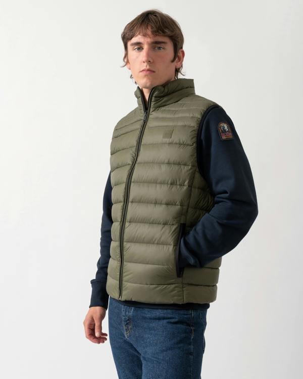 model wearing a BOSS Orange Odeno 2 Mens Gilet in Bright Green 325
