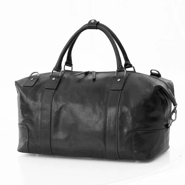 Rear view of Orion black leather holdall travel bag by Primehide showing stitching detail and structure.