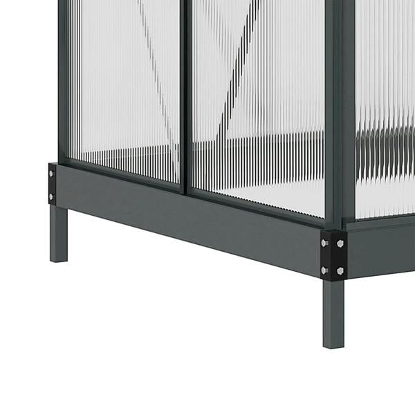 Grey greenhouse base with raised legs and transparent polycarbonate lower panels