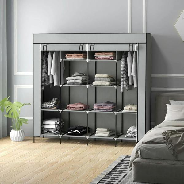 Portable dark grey fabric wardrobe open front with hanging rails, shelves, and drawers