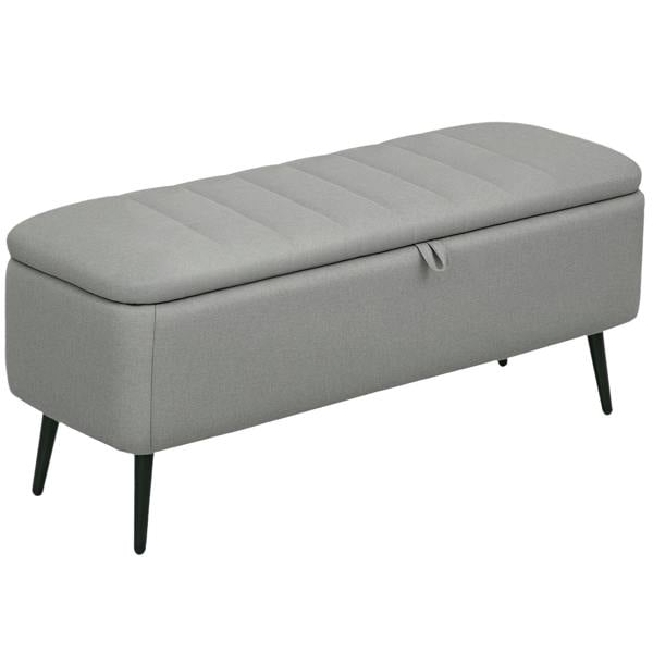 Light grey linen-look storage ottoman bench with upholstered hinged lid and tapered legs