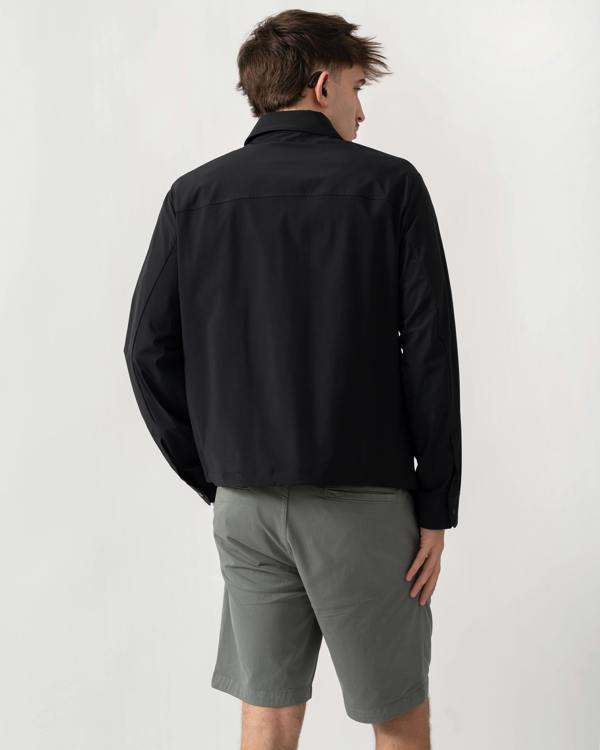 back shot of a model wearing an Armani Exchange Mens Jacket XM002818-AF22572 in Black UC001