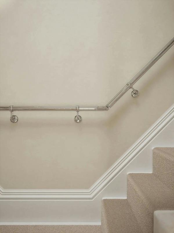 close up of the Radway Chrome T-shape handrail system showing brackets and elbow.