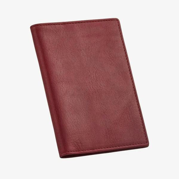 Bordeaux leather passport holder on a white background