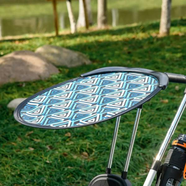 Blue patterned canopy with front support poles on kids tricycle