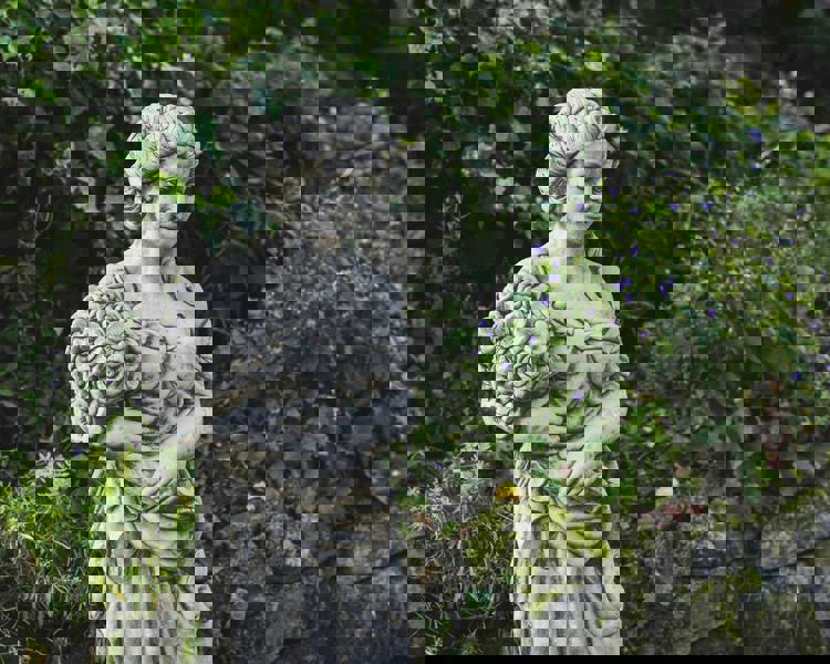 Tall Stone Cast Lady with Flowers