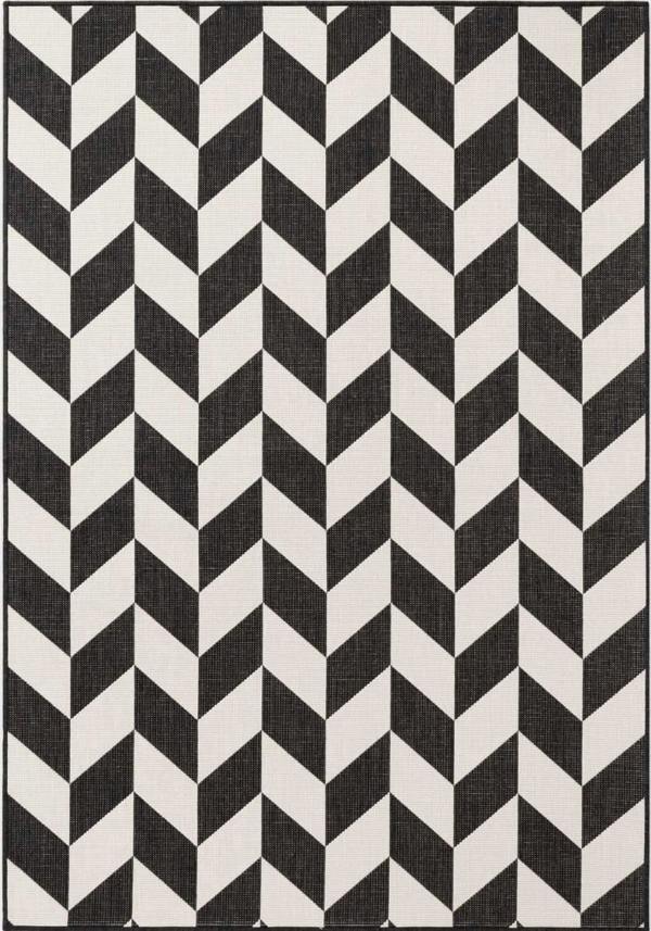 Black and white geometric patterned rug