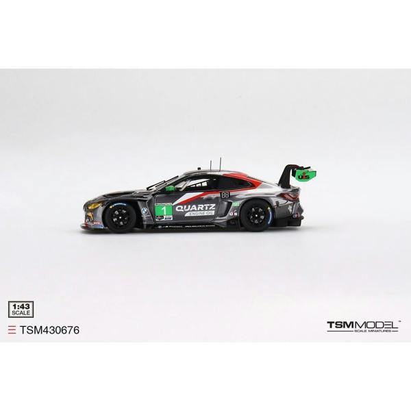 a toy race car with a white background