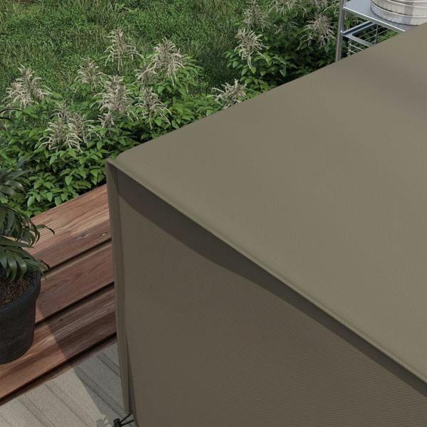 Grey patio furniture cover with tight-fitting edge and tie cords