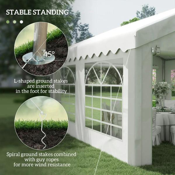 White party tent canopy with arched windows and ground stakes for stability