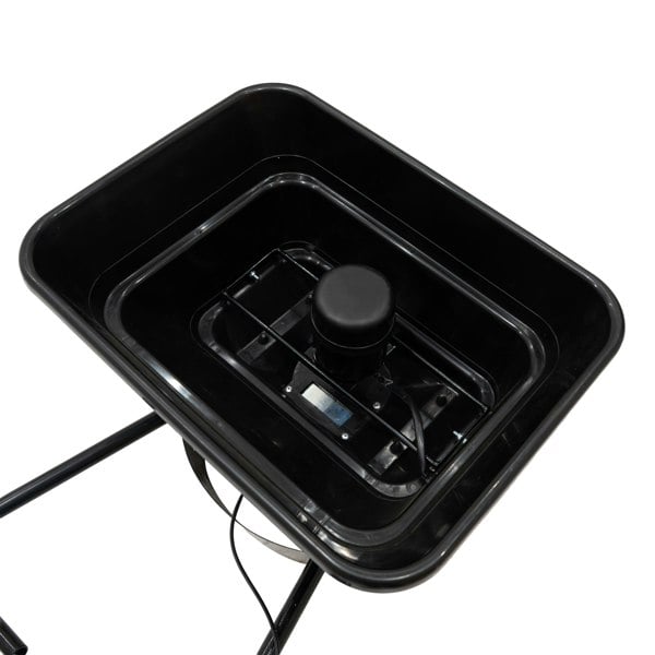Black ATV mounted spreader with a sturdy frame, featuring a spacious hopper and a central motor for efficient spreading