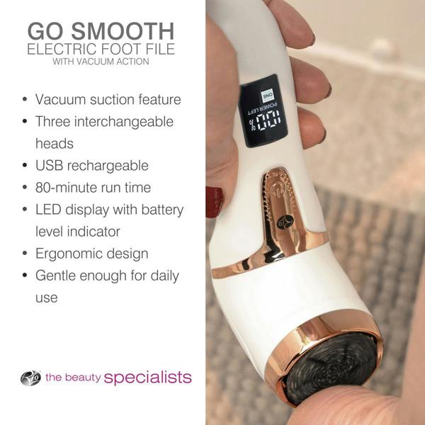 A hand holds the Rio Go Smooth Electric Foot File Hard Skin Remover with Vacuum Action above a heel. Features like vacuum suction, interchangeable heads, LED display, and ergonomic design are listed. Beauty specialists logo appears below.