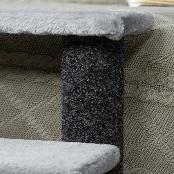 Grey plush step and dark scratching post with textured fabric