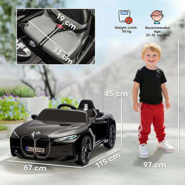 Black kids electric ride-on car, steering wheel and dashboard in close view