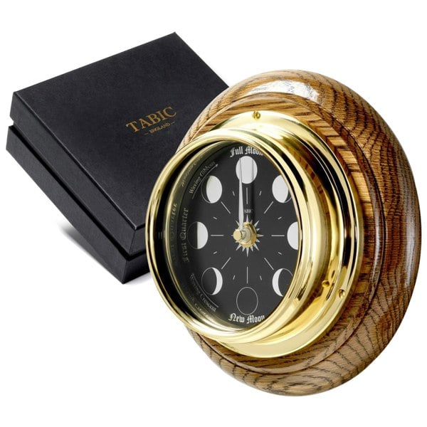 Tabic Prestige Brass Moon Phase Clock With a Jet Black Dial Mounted on Solid English Dark Oak