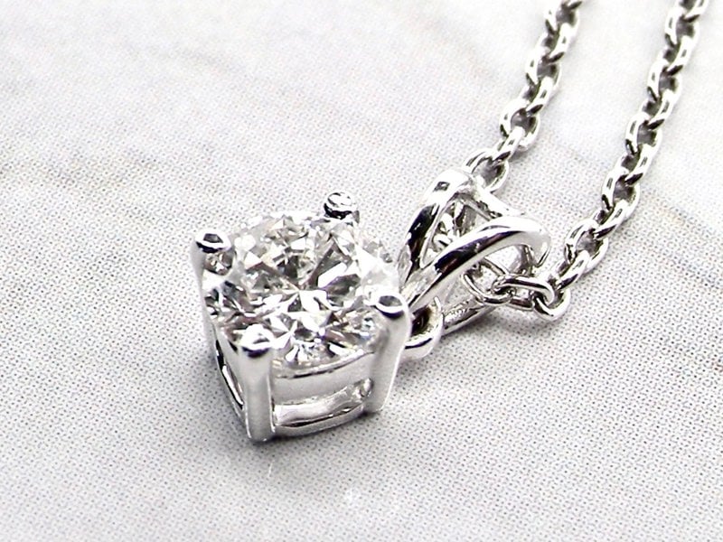 Vintage Tom A fine half carat diamond pendant