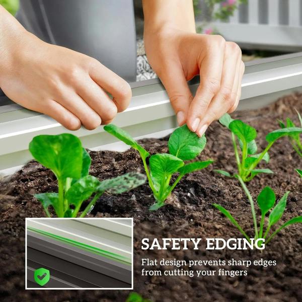 Dark grey steel planter box with safe edge design, hands planting small green seedlings