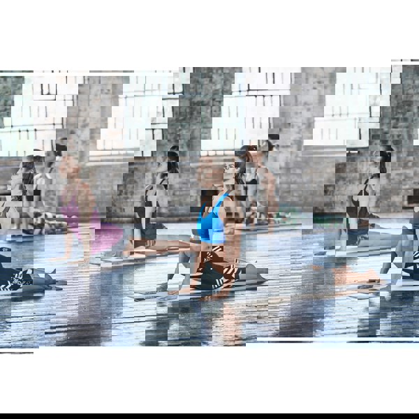 Stretching with the Reebok Studio Yoga Mat - Grey