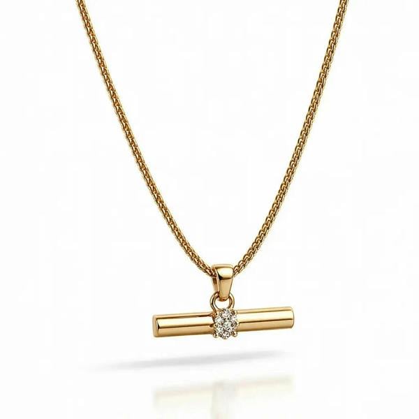 Gold necklace with a bar pendant on a white background
