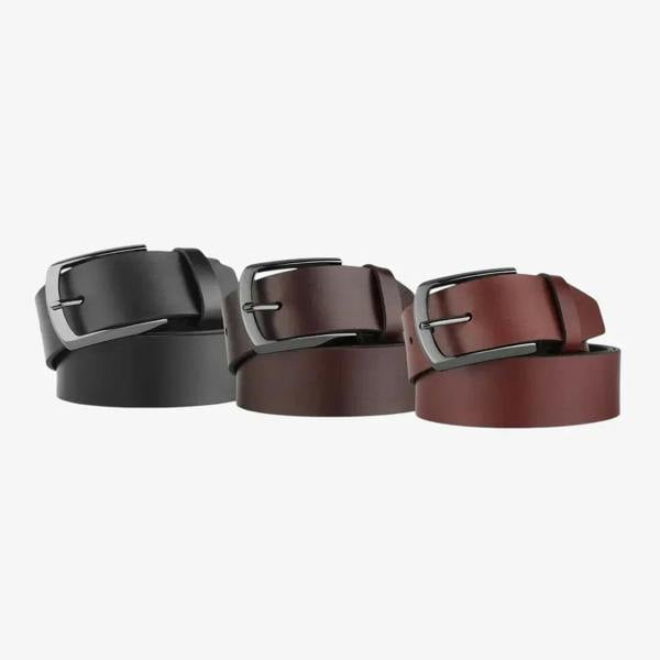 Three belts in black, brown, and cognac with silver buckles on a light gray background