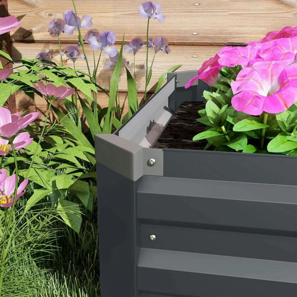 Dark grey galvanized steel planter corner, open top, rounded edge with visible screws