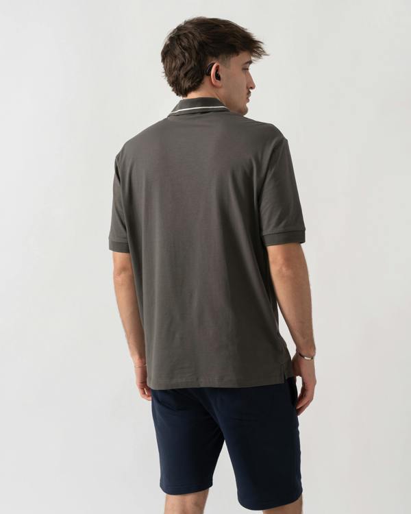 back shot of a model wearing an Armani Exchange Mens Milano/New York Polo Shirt with Contrast Tipping in Chimera M8317