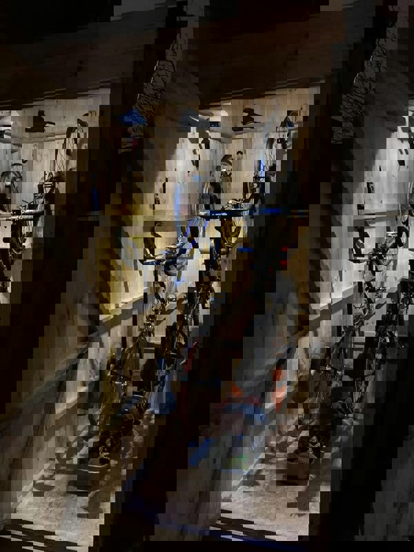 bike wall hanger in a shed