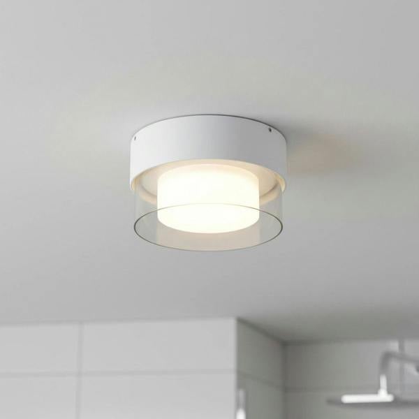 white round bathroom ceiling light installed in a modern bathroom 