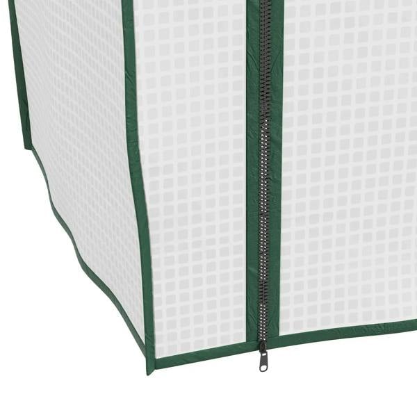 White mini greenhouse side panel with green trim and zippered seam at the corner, close-up